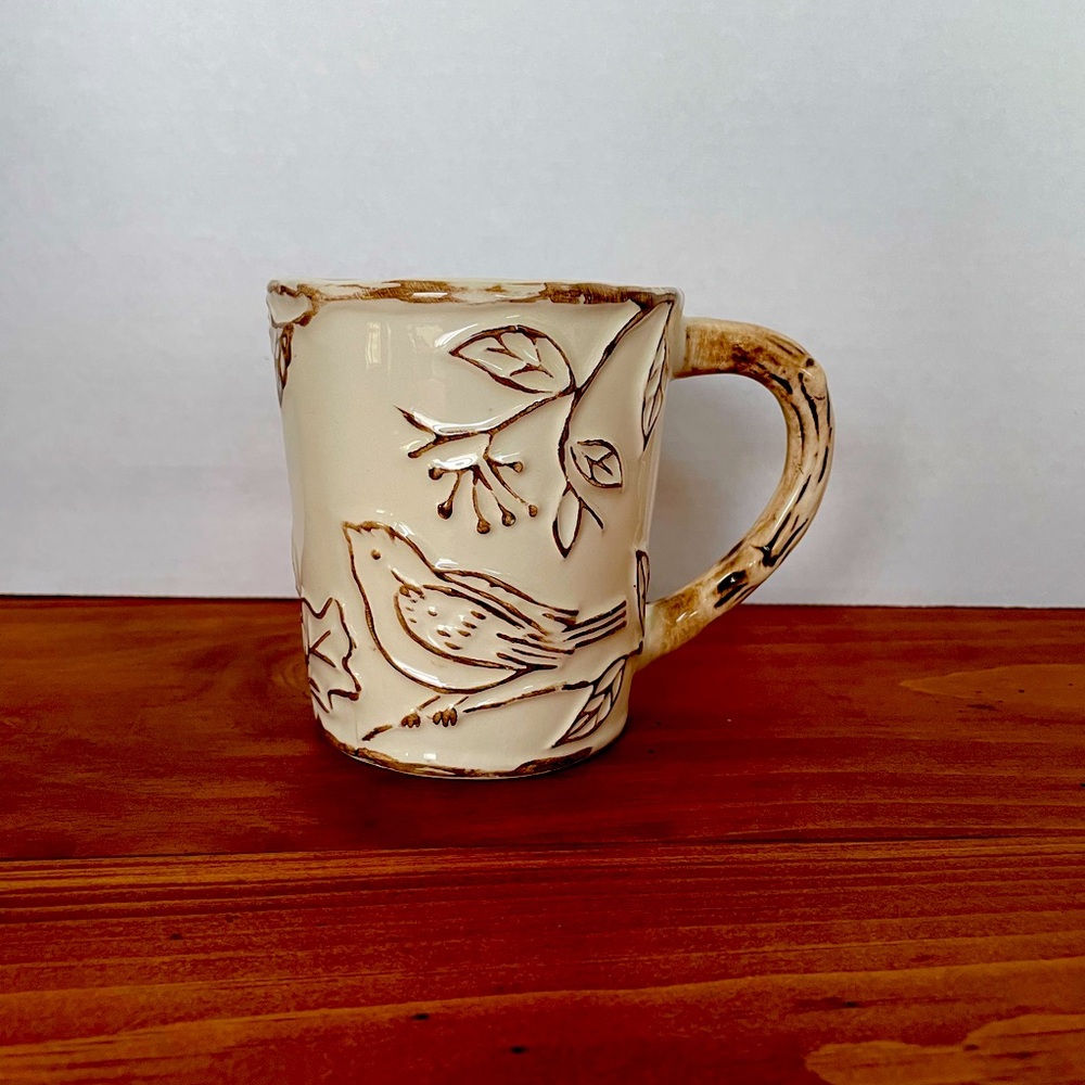 Handcrafted Cream Bird inTree Embossed  Mug.  Susan Winget design